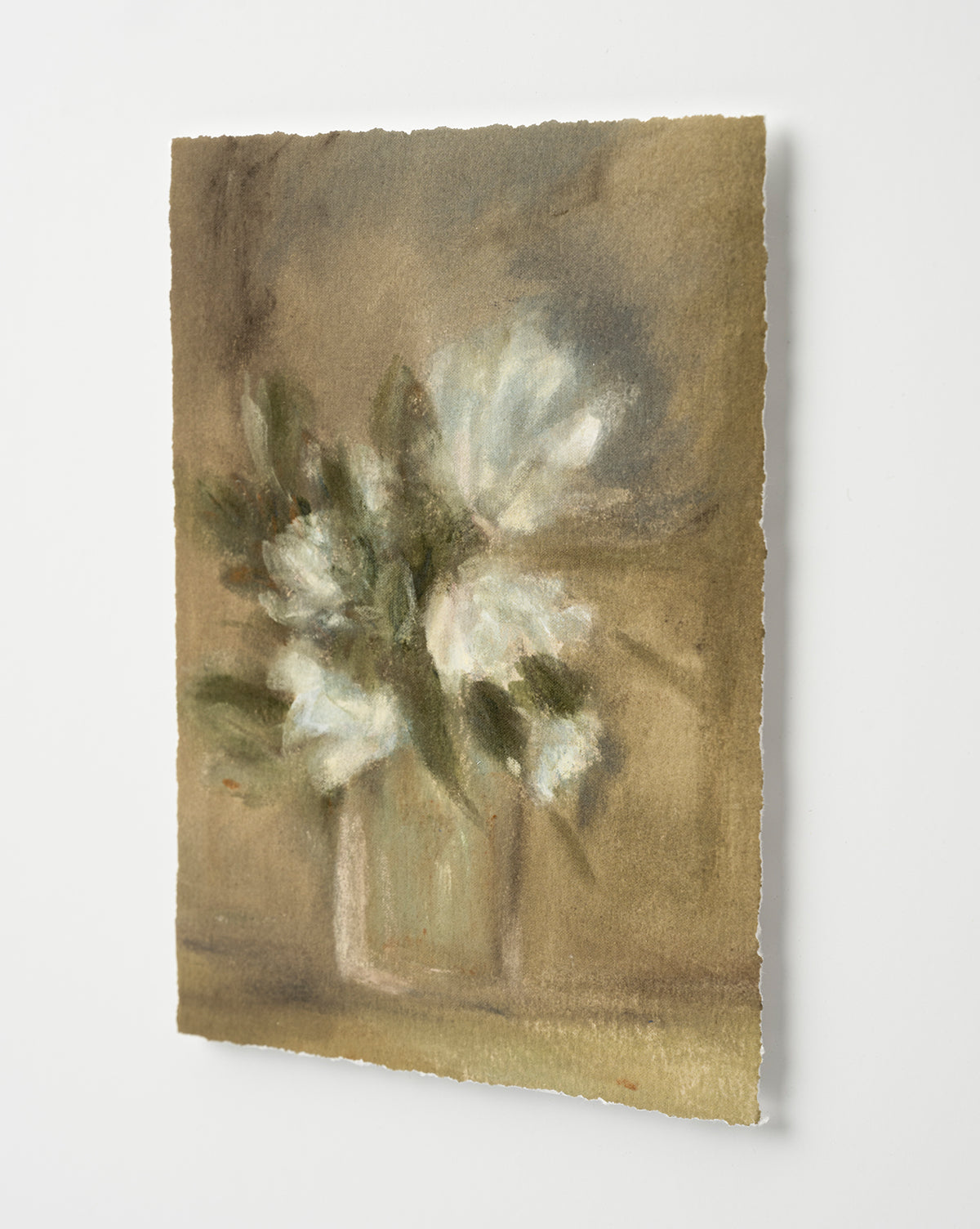Flower Vase Still Life by Katie Mulder features soft-focus white flowers with green leaves in a vase on textured paper, set against a neutral background—an impressionistic piece ideal as a giclee print or framed in wood, by Vendixs