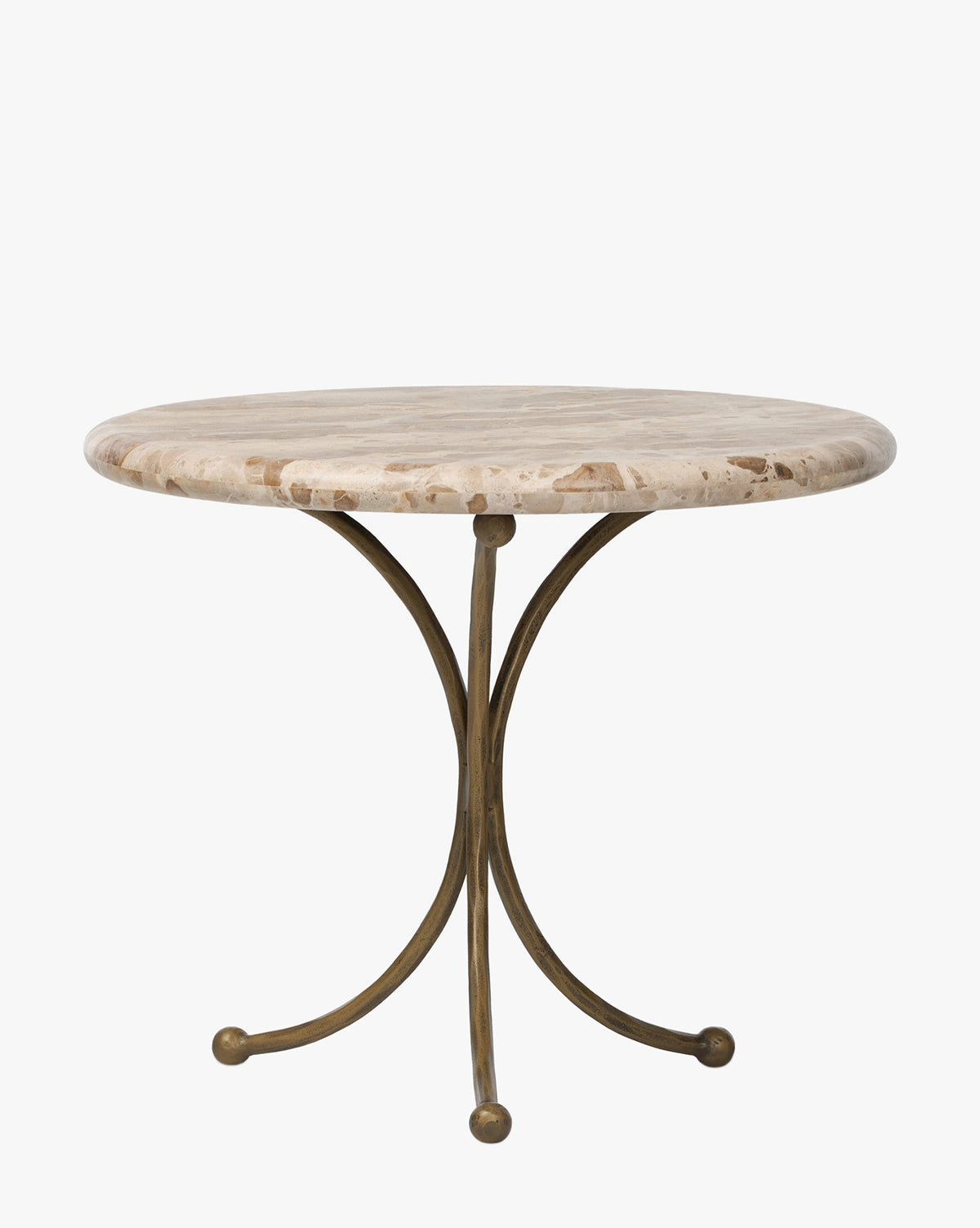 The Fossil Marble End Table showcases a round beige marble top and a curved three-leg metal base in hammered aged brass, each ending in a rounded foot, set against a plain white background, by Vendixs