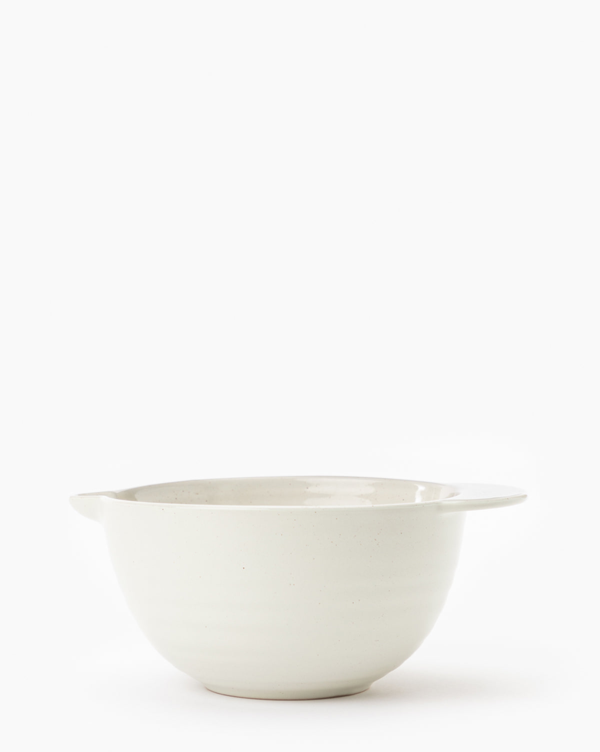The Fullmer Stoneware Batter Bowl, in plain white with two small handles on opposite sides, is displayed against a white background by Vendixs