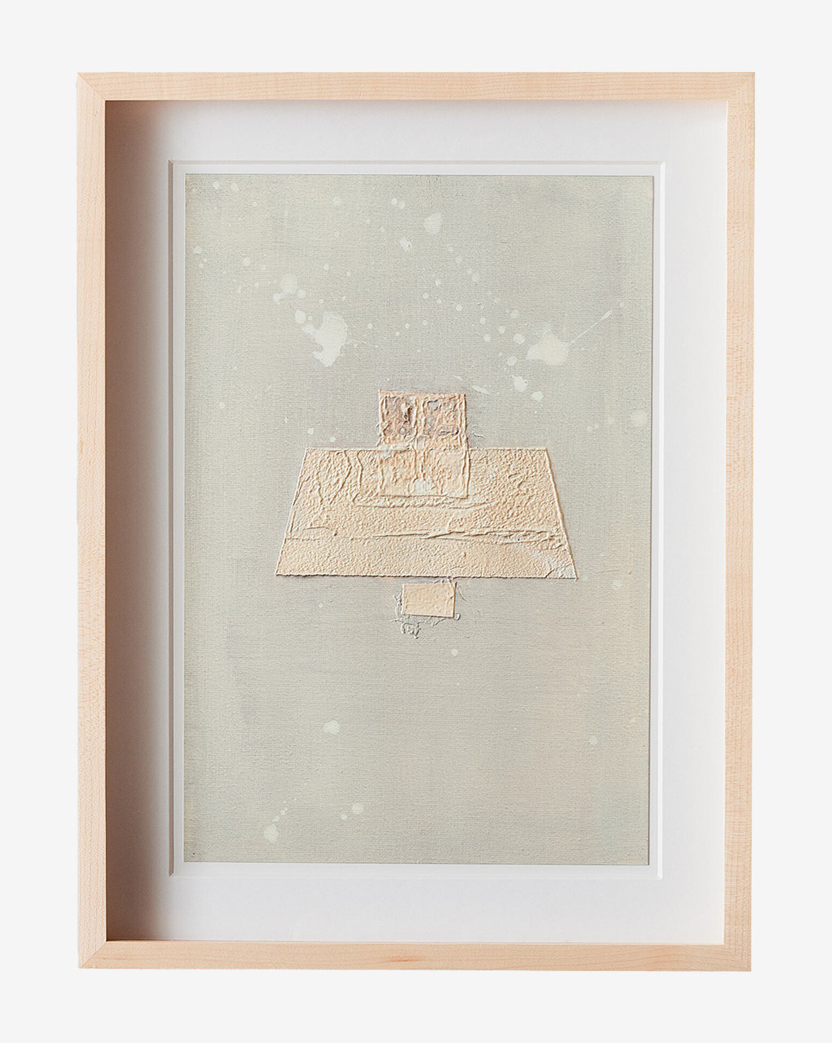 Galactic VIII by Jade Dacay is a framed minimalist artwork featuring textured beige geometric shapes on a neutral background with white splatters. This mixed media piece in a light wood frame is modern wall decor by Vendixs