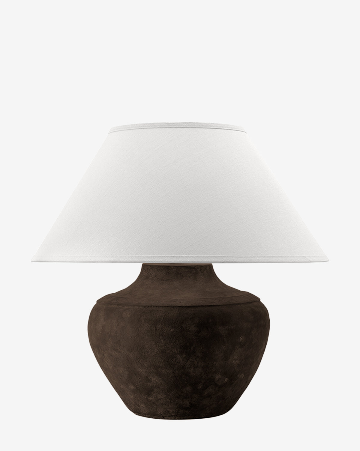 The Troy Lighting Gannon Table Lamp showcases an earthen-textured, round dark brown base with a wide white fabric shade, shown against a plain white background. Vendixs
