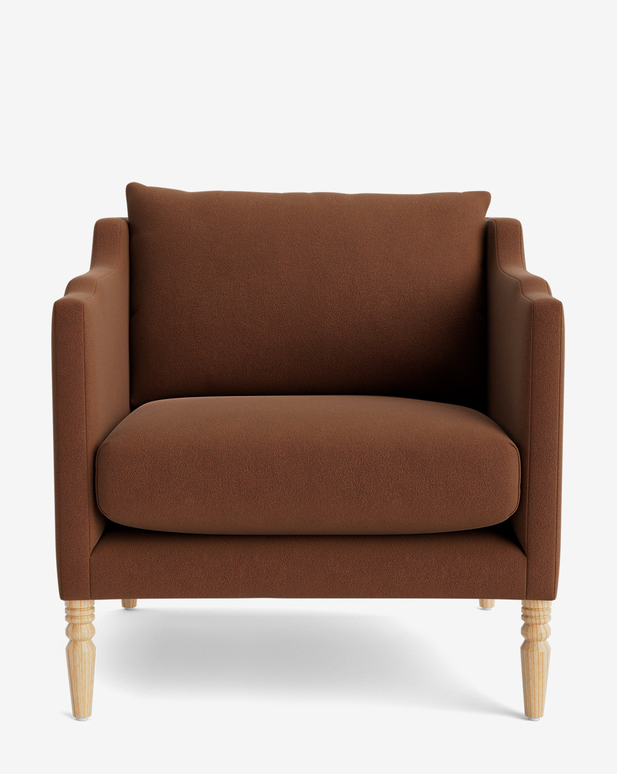 A front view of the Gemma Lounge Chair, upholstered in brown high-quality fabric with traditional turned wooden legs and cushioned seat and backrest, set against a plain white background by McGee & Co.