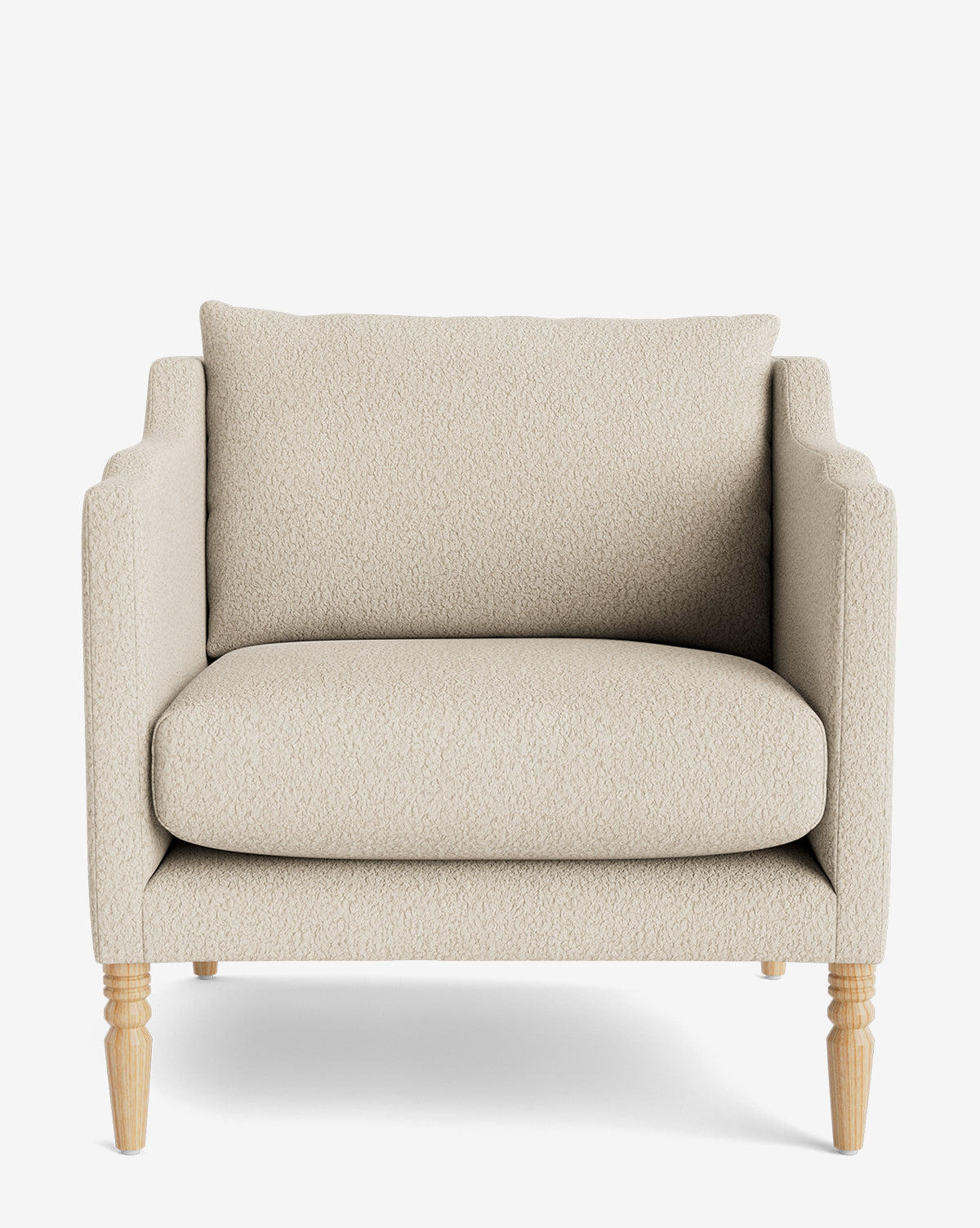 The Gemma Lounge Chair showcases cream fabric upholstery, a wide cushioned seat and back, square armrests, and four light wood legs, all set against a white background by McGee & Co.