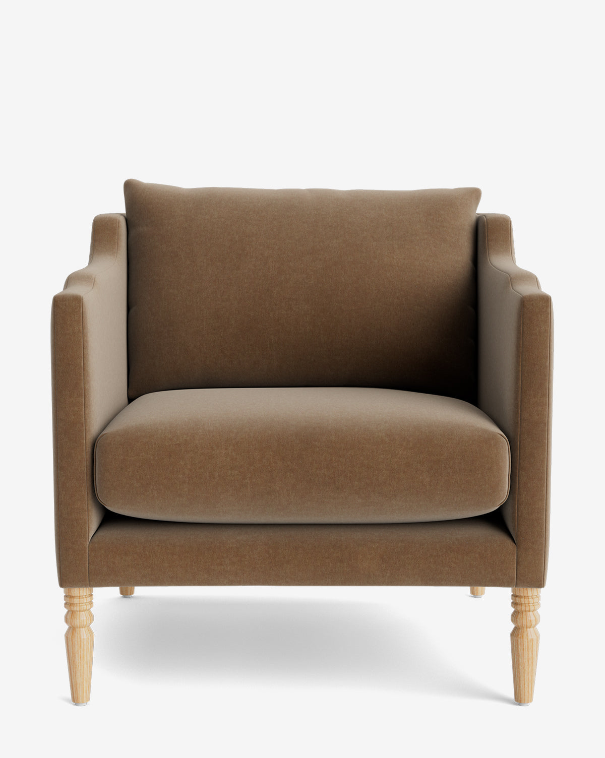 The Gemma Lounge Chair is a spacious brown upholstered armchair with straight arms, a plush cushion, and traditional light wood turned legs, made from high-quality fabric and displayed against a plain white background, by McGee & Co.
