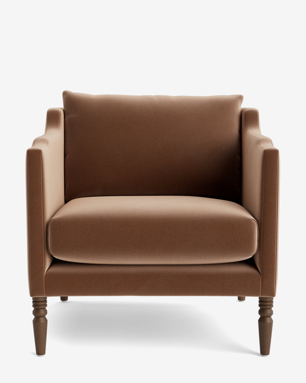 The Gemma Lounge Chair is a brown upholstered armchair with high-quality fabric, thick seat and back cushions, a boxy silhouette, and traditional turned legs, pictured from the front on a white background by McGee & Co.