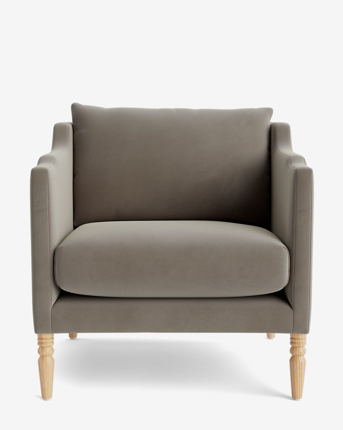 The Gemma Lounge Chair is a modern armchair with light brown high-quality fabric, wide cushioned seat and back, slightly angled arms, and four light wood legs, shown from the front on a plain white background by McGee & Co.