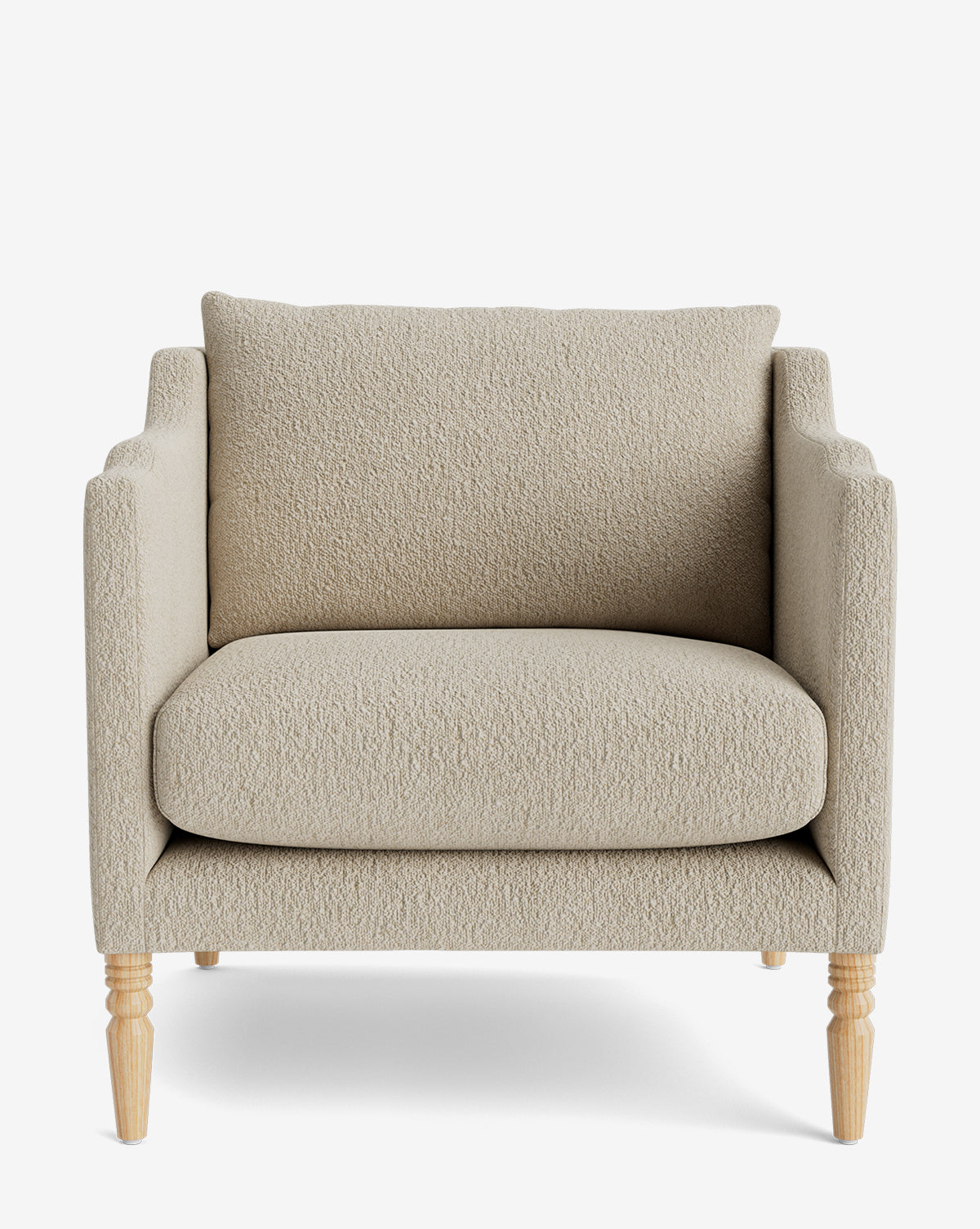 The Gemma Lounge Chair is a beige upholstered armchair featuring square arms, a plush seat cushion, high-quality fabric, and light wooden legs, displayed facing forward on a plain white background by McGee & Co.