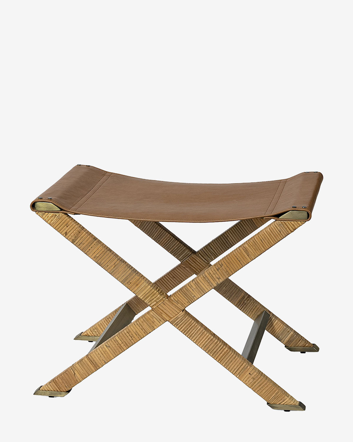 The Palecek Gertie Stool showcases a tan leather seat and light wood X-shaped legs, offering a stylish and functional accent piece against a plain white background. Vendixs