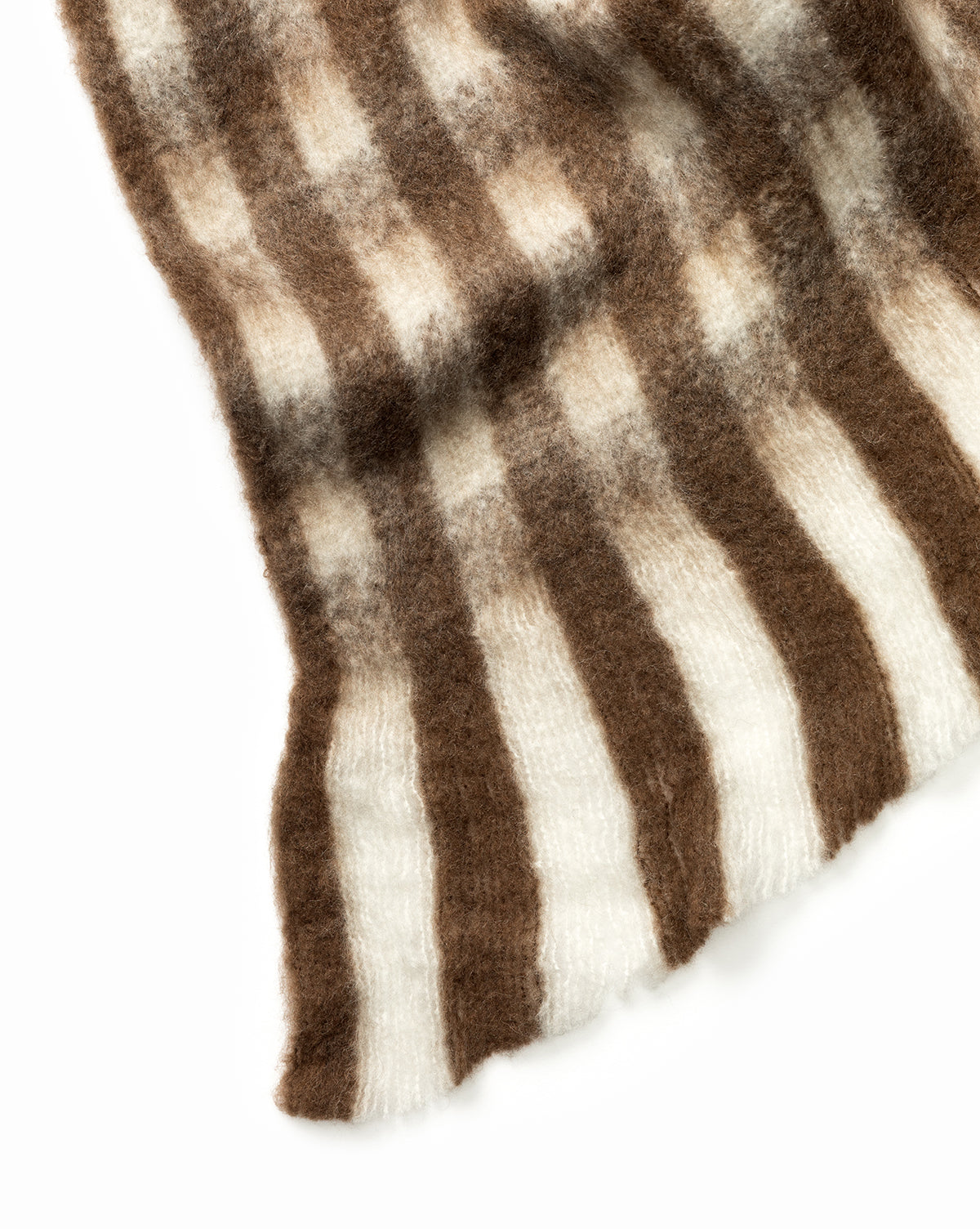 The Indaba Gingham Wool Blend Throw features a soft, fuzzy texture with vertical stripes in brown and white, displayed against a white background. Vendixs