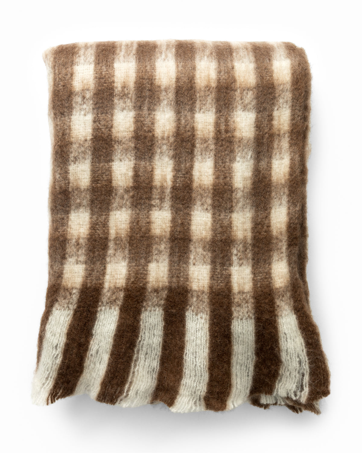 The Indaba Gingham Wool Blend Throw features a fluffy, folded design with a brown and cream checkered pattern and wide cream stripes at one end, displayed on a white background. Vendixs