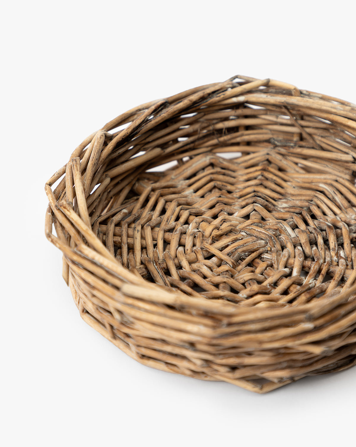 A close-up of the Glass Cloche with Woven Base, featuring an empty, round wicker base and intricate woven details, perfect for showcasing decorative items against a white background, by Vendixs