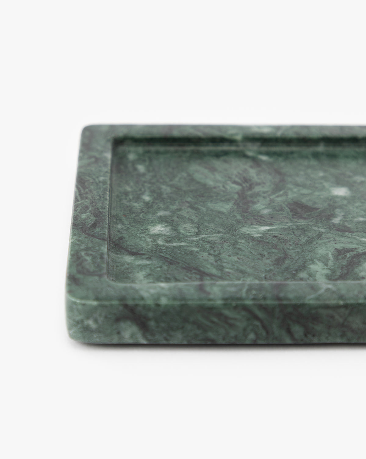 A close-up of the Green Marble Nesting Tray—a rectangular tray with a recessed center—displayed on a white background, ideal for decorative vignettes, by Vendixs