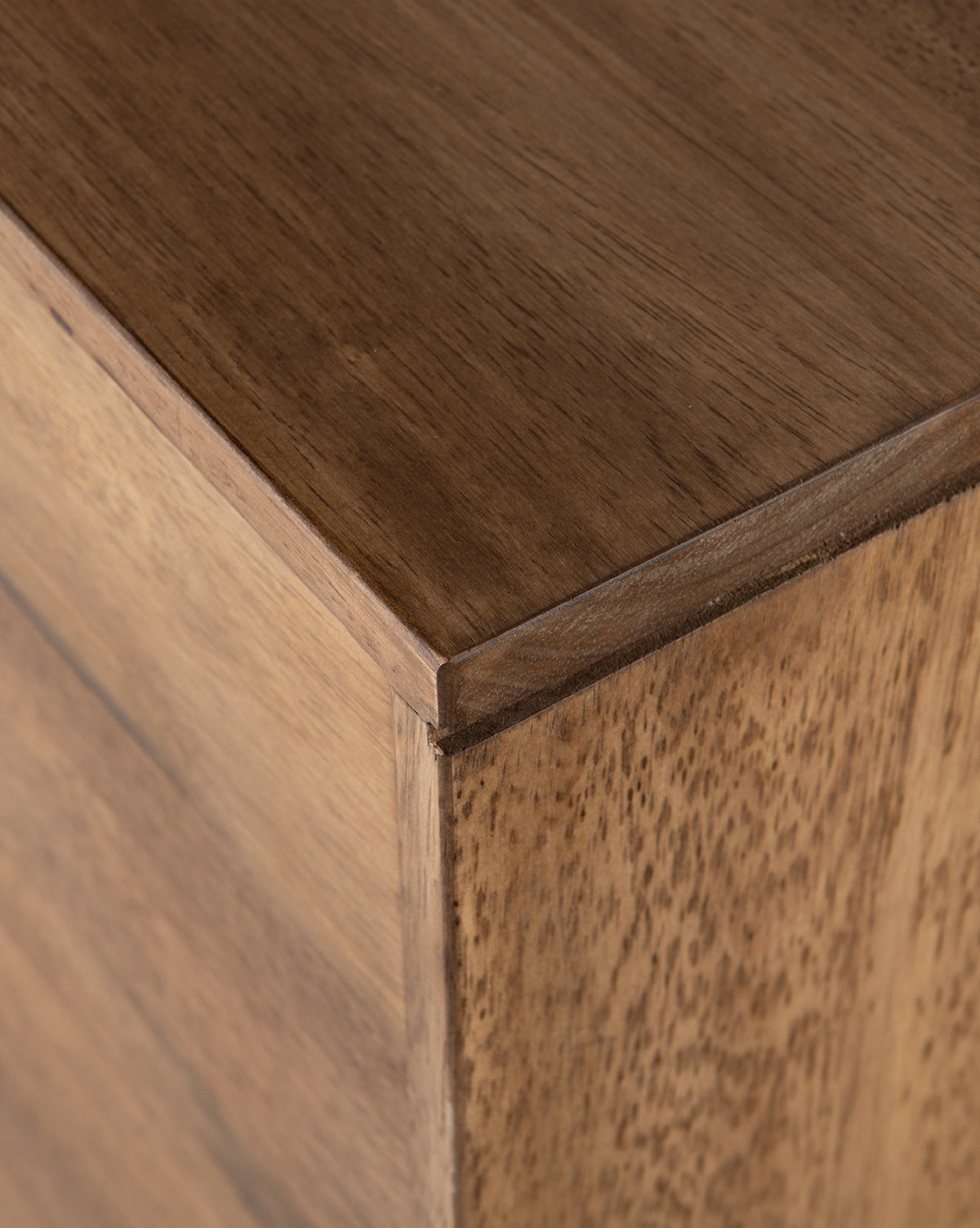 Close-up of Gustav Console corner shows its smooth surface, light brown natural wood grain, and smart media cord management for a seamless mid-century look, by Vendixs