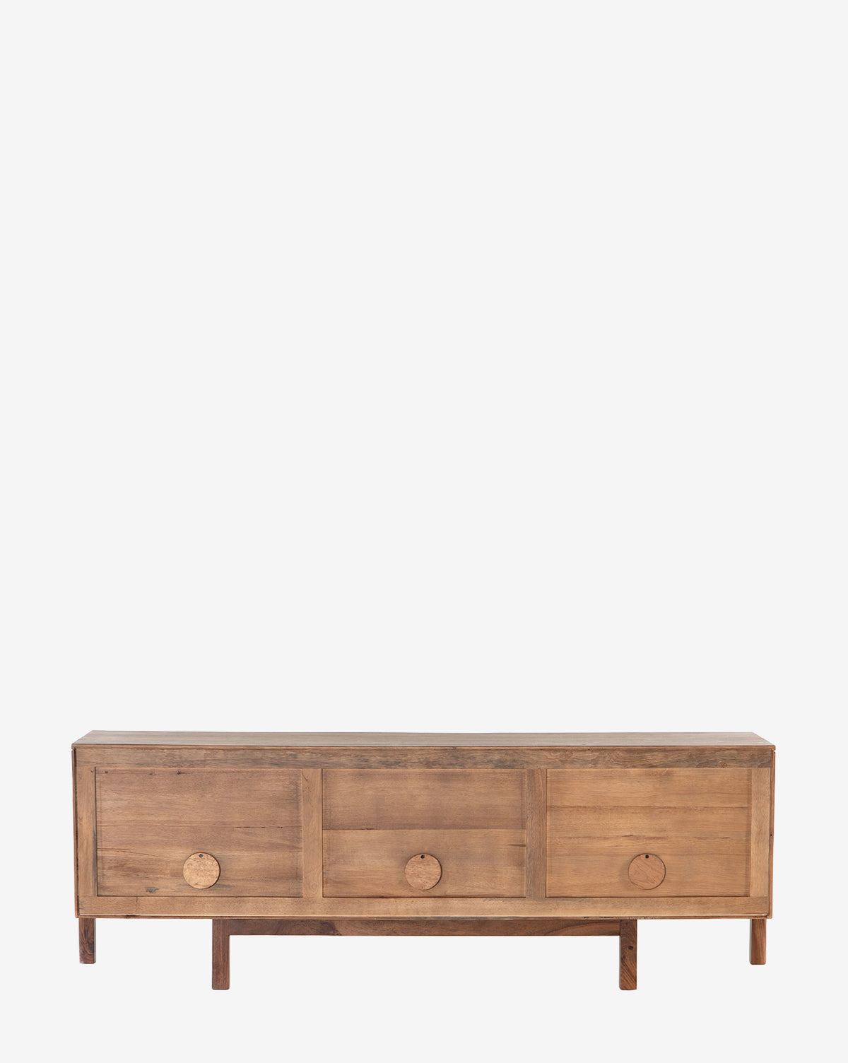 The Gustav Console is a wooden sideboard with three front drawers, each with a round wooden handle. This mid-century piece stands on four short legs and features a minimalist design, shown against a white background by McGee & Co.