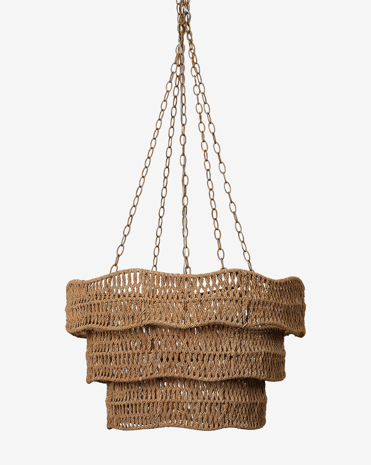 The Made Goods Halina Chandelier features three wavy, stacked layers of woven rattan in a tiered design, hanging from four metal chains, shown against a plain white background. Vendixs