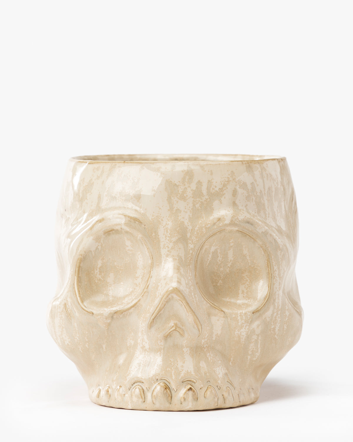 The Haunting Skull Vase is a beige ceramic vase shaped like a human skull with detailed features—an ideal statement piece or spooky addition to your Halloween décor, by Vendixs Displayed on a plain white background.