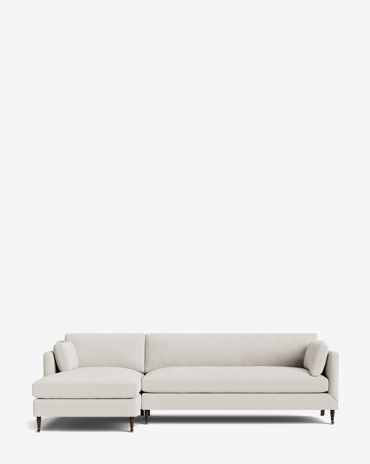The Rowe Fine Furniture Haverford Upholstered Left Chaise Sectional features modern light gray fabric, slim armrests, two matching back pillows, and short dark tapered legs, shown on a plain white background. Vendixs