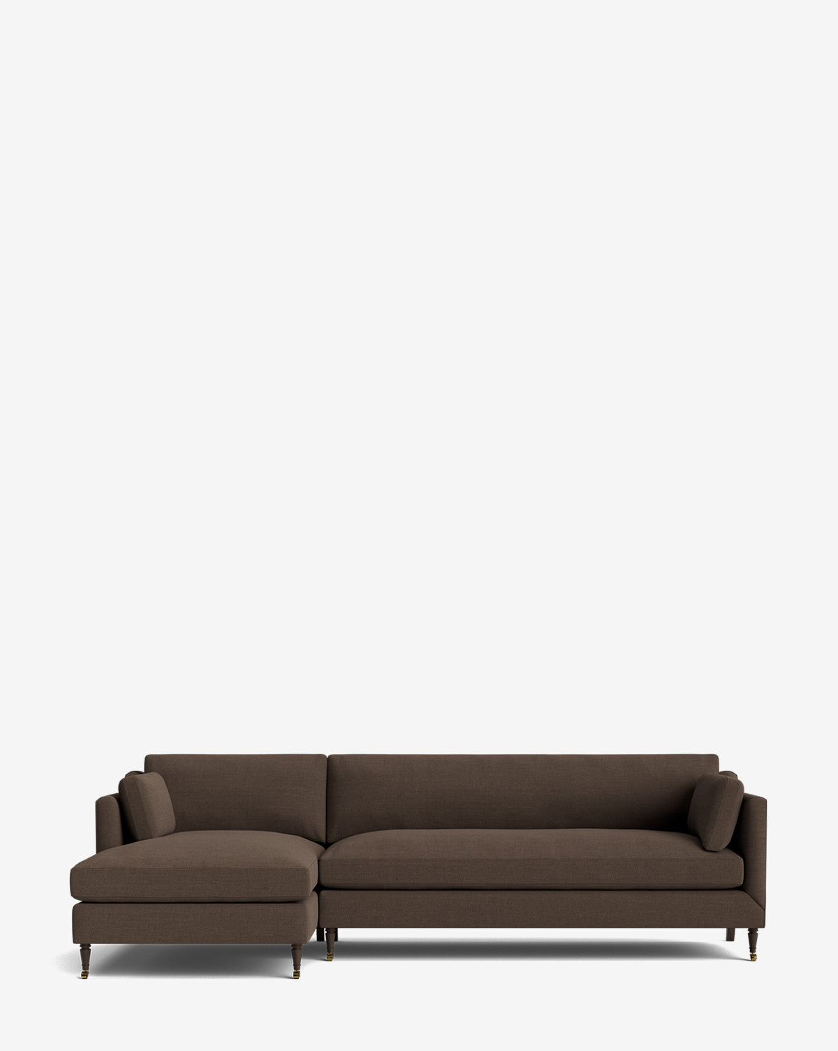 The Haverford Upholstered Left Chaise Sectional by Rowe Fine Furniture showcases dark brown upholstery and slim legs with brass-colored tips, set against a white background, Vendixs
