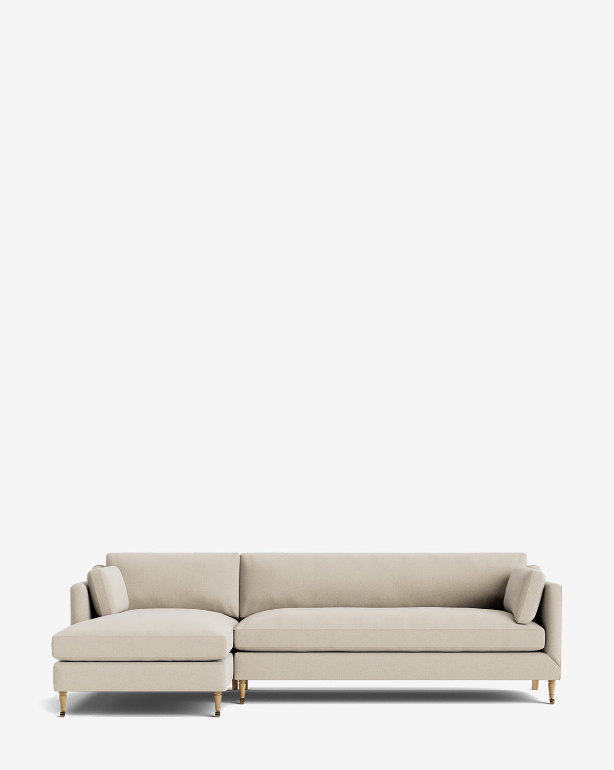 The Haverford Upholstered Left Chaise Sectional by Rowe Fine Furniture features gold-tipped legs and two matching cylindrical pillows, shown against a plain white background, Vendixs