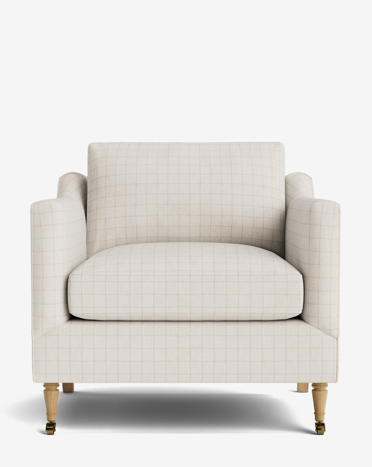 The Haverford Upholstered Lounge Chair is beige with a subtle grid pattern, a wide cushioned seat, square arms, and light wooden legs with front brass casters, shown against a plain white background by McGee & Co.