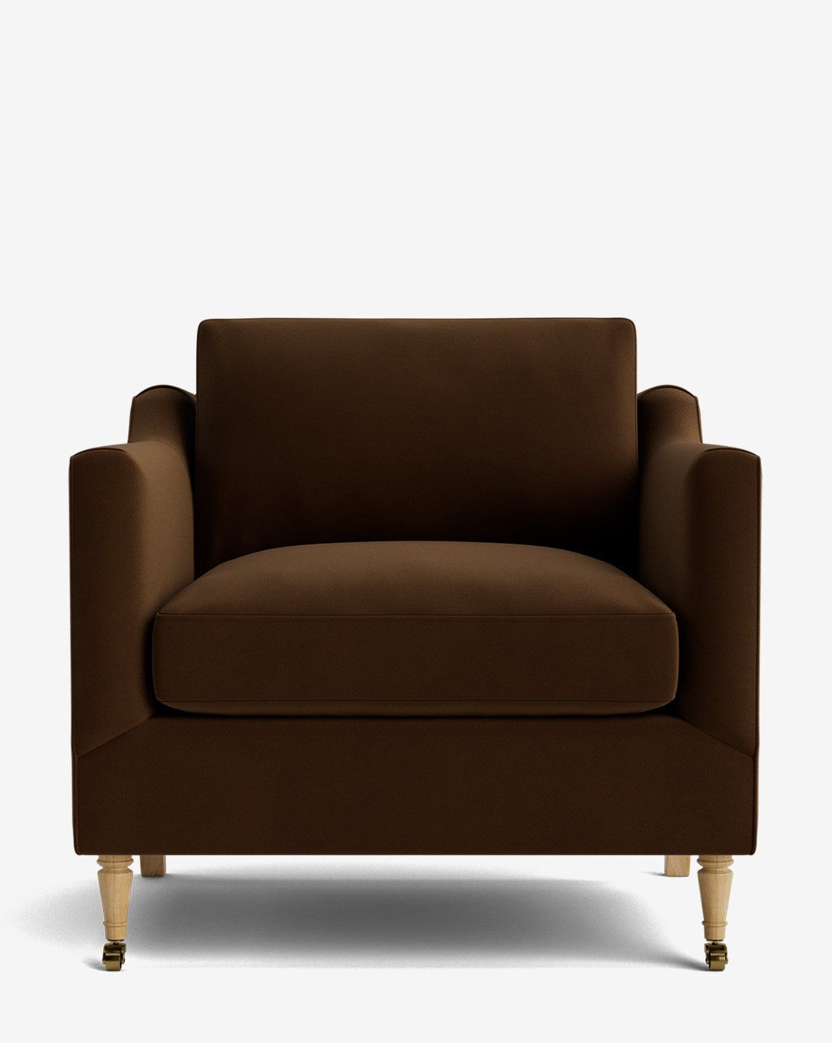 The Haverford Upholstered Lounge Chair features brown upholstery, squared arms, a cushioned back, and wooden legs with brass caster wheels on the front. Shown customizable against a plain white background by McGee & Co.