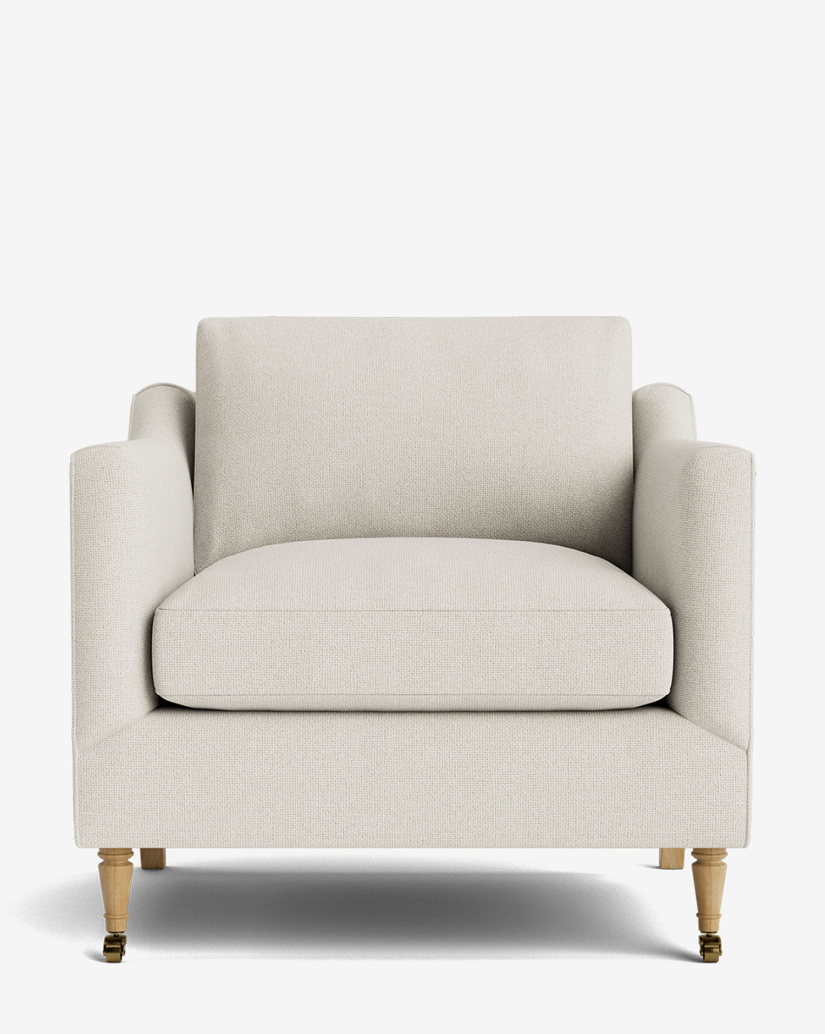The Haverford Upholstered Lounge Chair features a boxy design, wide seat, padded arms, light wooden front legs with brass casters, and straight wooden back legs against a white background by McGee & Co.