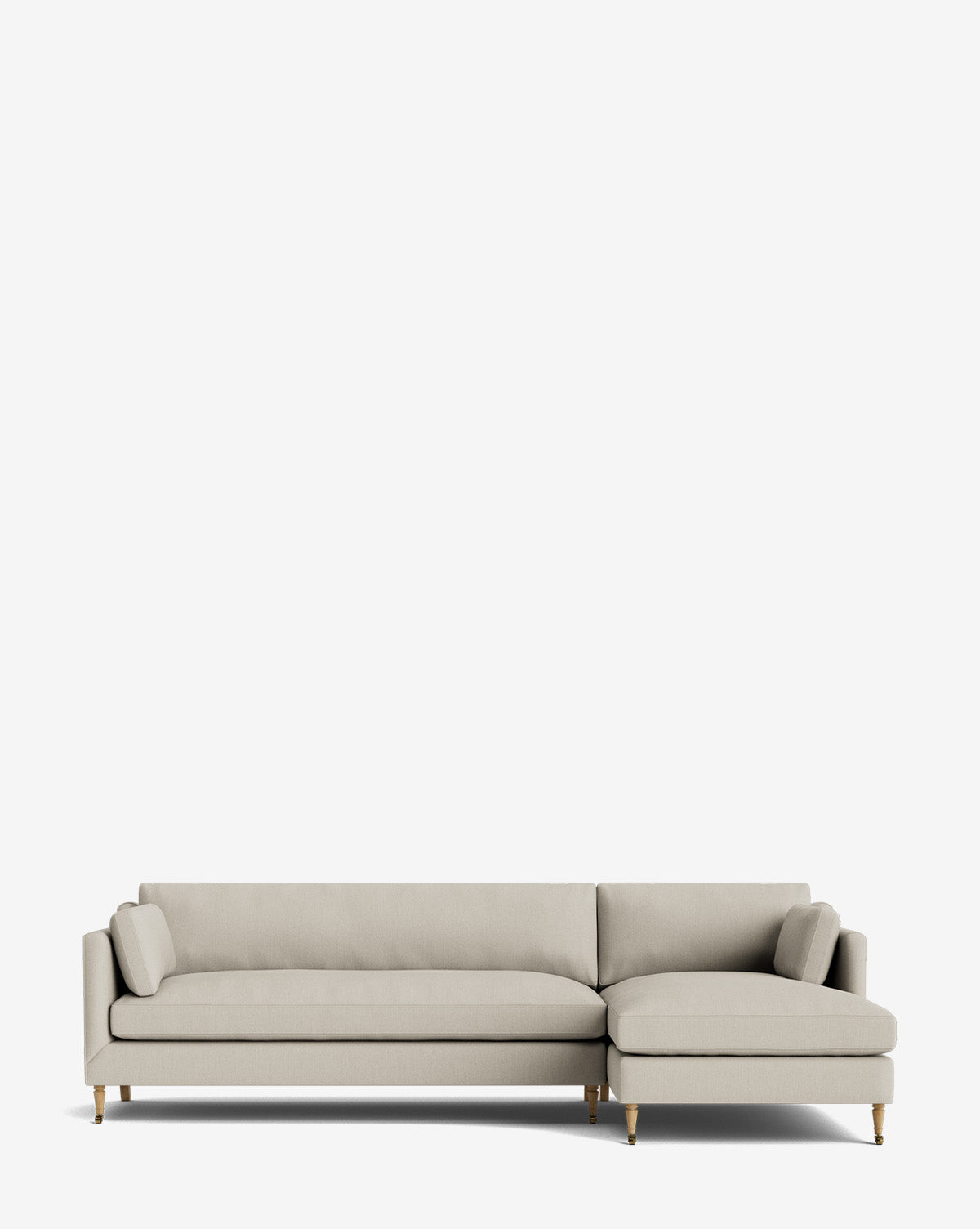 The Haverford Upholstered Right Chaise Sectional 113 features a light beige modern design with wooden legs, a right-facing chaise, and is fully customizable—perfect for any contemporary space, by McGee & Co. Set against a plain white background.