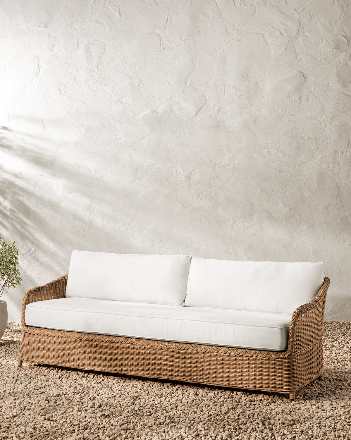 Vendixs woven wicker outdoor sofa. 