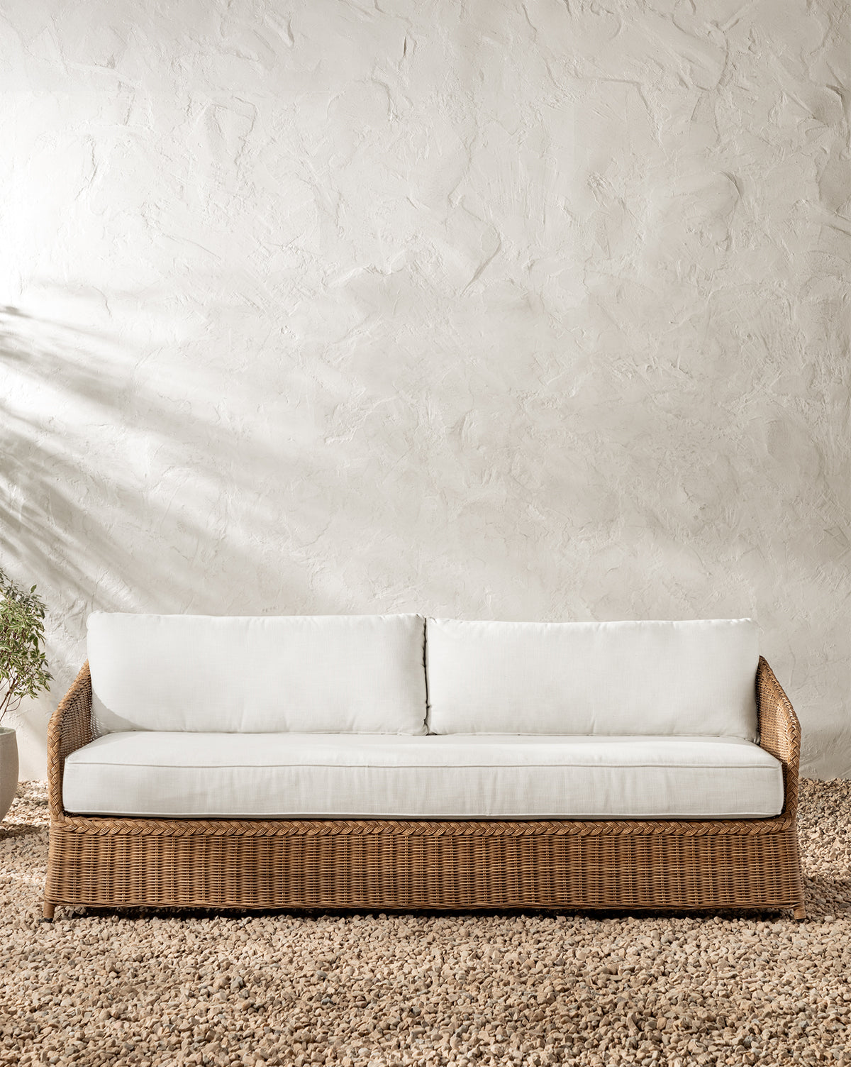Vendixs woven wicker outdoor sofa. 