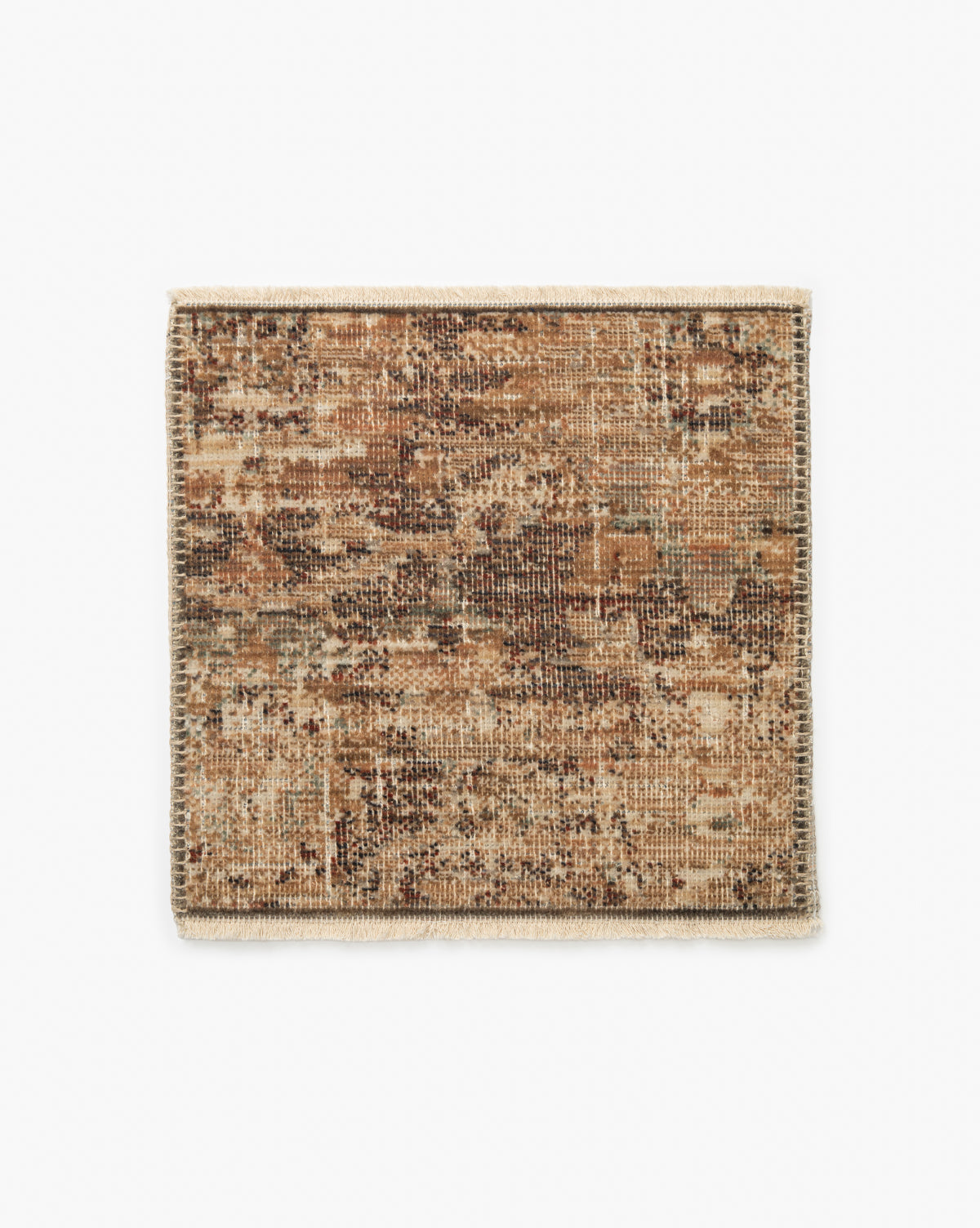 The Heatherington Neutral Rug Swatch features a rectangular shape with a mottled brown, beige, and tan pattern, cream-colored fringe on the short edges, a textured woven look, and durable high-quality construction, by McGee & Co.