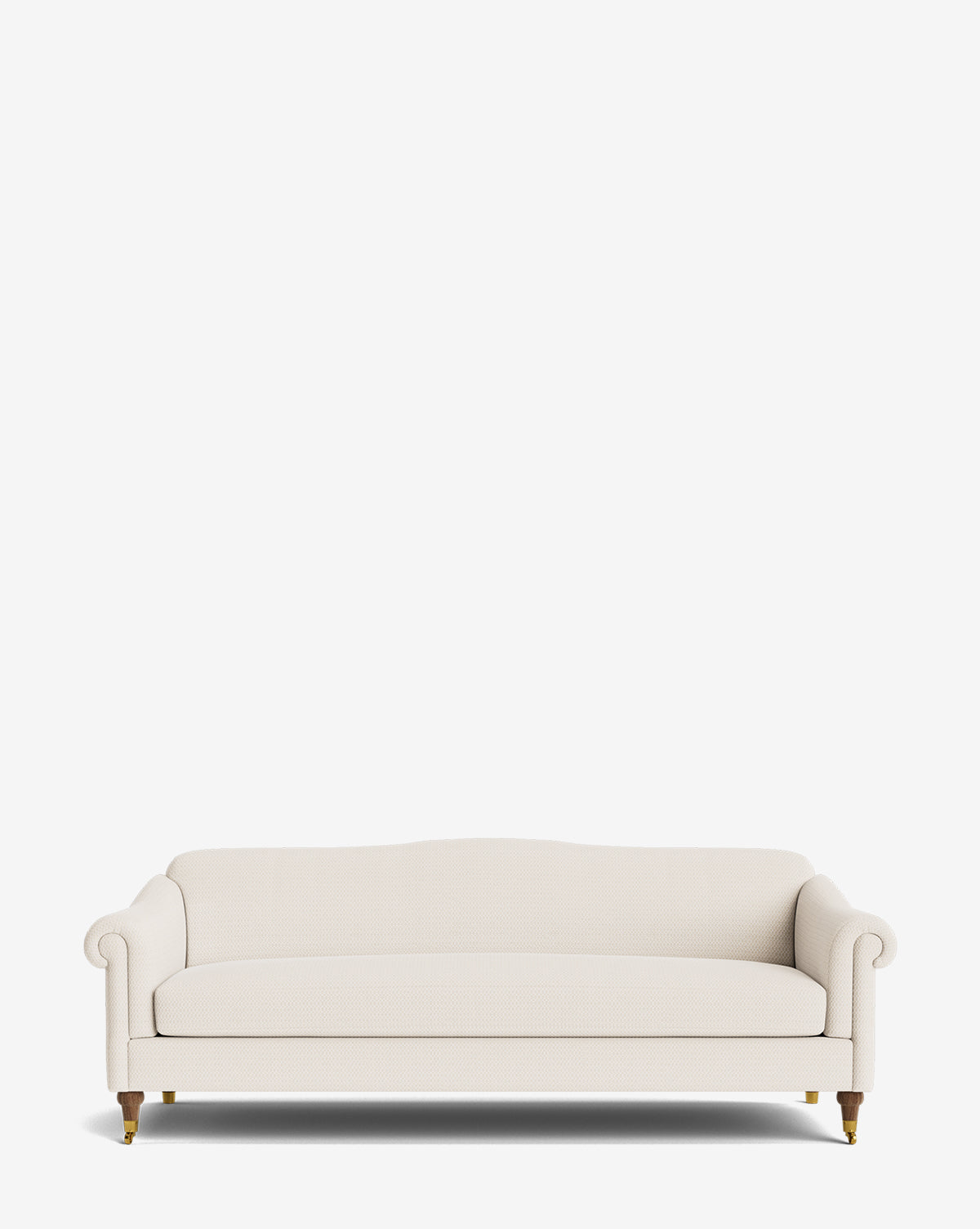 The Hildegard Sofa 90 is a cream upholstered, handcrafted sofa featuring rolled arms, a slightly curved backrest, and wooden legs with caster wheels, shown against a plain white background by Vendixs