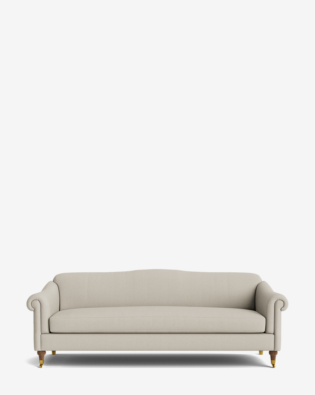 The Hildegard Sofa 90 is a beige upholstered, handcrafted sofa featuring rolled arms, a cushioned back, and wooden legs with brass tips, shown against a plain white background by Vendixs