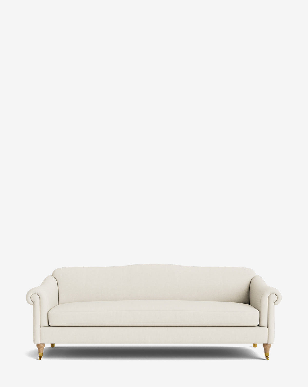 The Hildegard Sofa 90 is a cream, three-seater handcrafted sofa with rolled arms and wooden legs with brass casters, shown on a plain white background, by Vendixs
