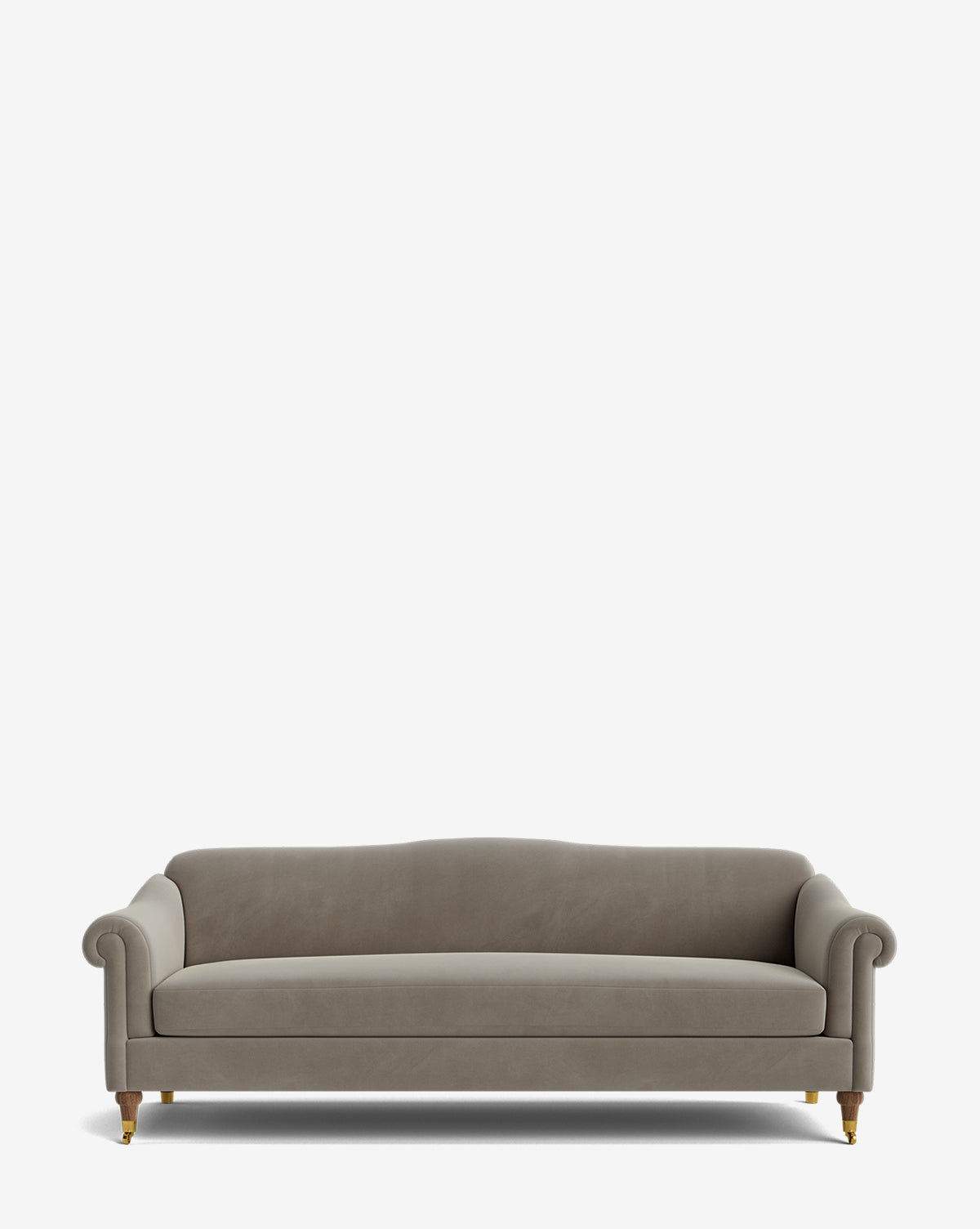 The Hildegard Sofa 90 is a grey upholstered, handcrafted sofa with rounded arms, a subtly curved backrest, and wooden legs featuring brass casters, shown against a plain white background by Vendixs