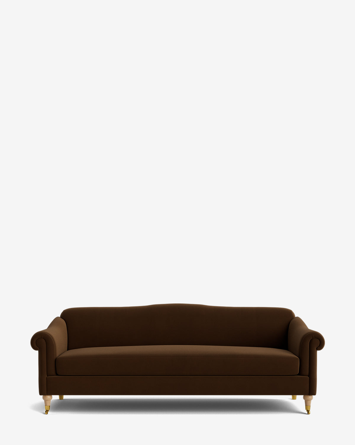 The Hildegard Sofa 90 is a dark brown, handcrafted upholstered sofa featuring rolled arms, a curved backrest, and short wooden legs with gold-colored feet, shown against a plain white background by Vendixs