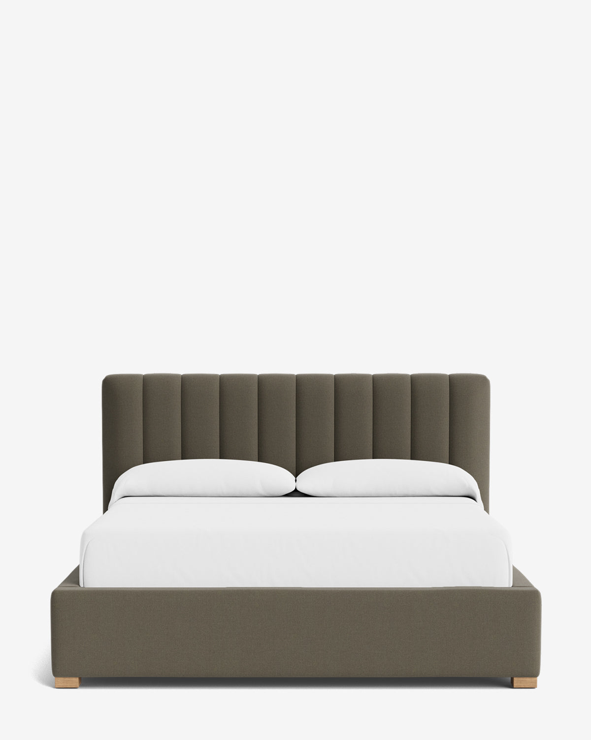 The Community Hoffman Bed Low Headboard features dark gray fabric, white bedding, and two pillows, displayed against a plain white background. Vendixs