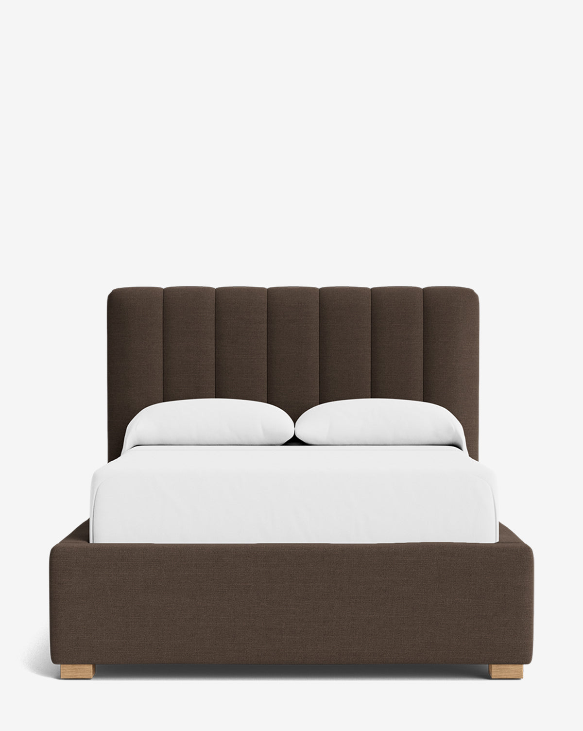 The Hoffman Bed Low Headboard features a brown upholstered frame with a low, customizable vertical-panel headboard, crisp white bedding, and two pillows, all set against a plain white background by McGee & Co.