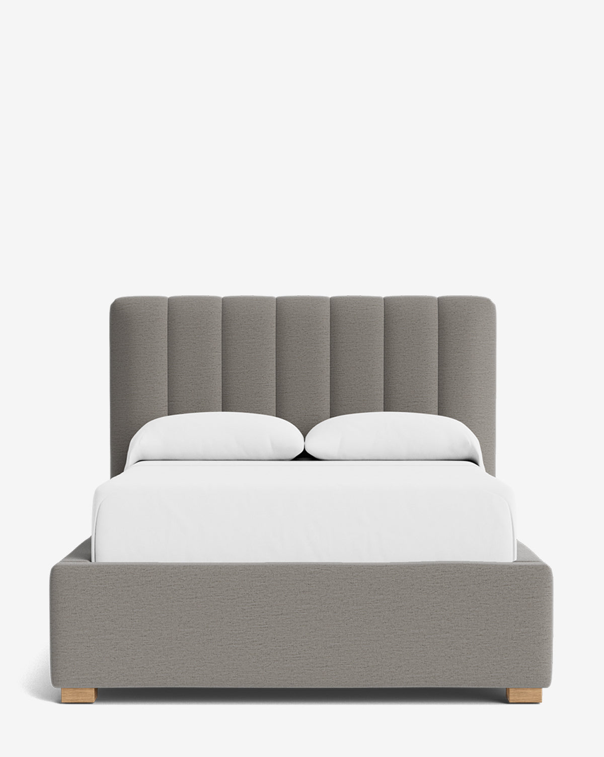 The Hoffman Bed Low Headboard, in gray upholstery, is shown from the front with crisp white bedding and two pillows, set against a plain white background by McGee & Co.