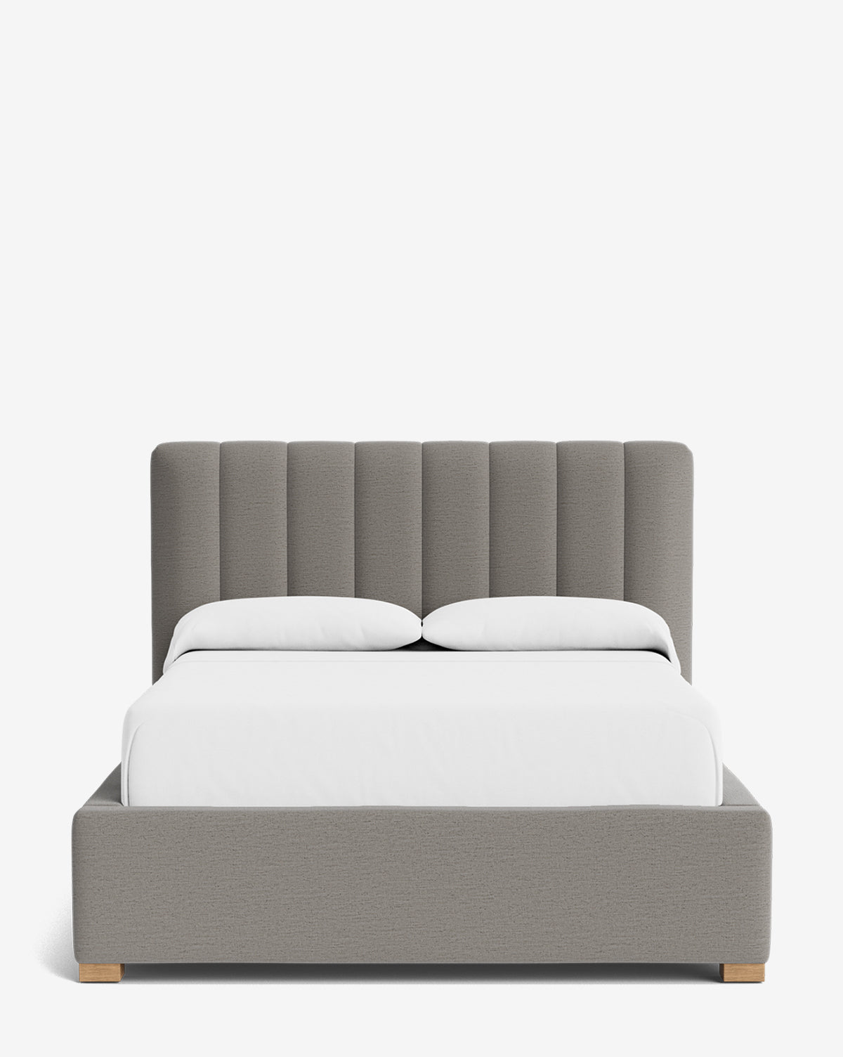 The Hoffman Bed Low Headboard is a modern upholstered bed with a gray customizable headboard and matching base, shown in crisp white bedding against a plain white background, by McGee & Co.