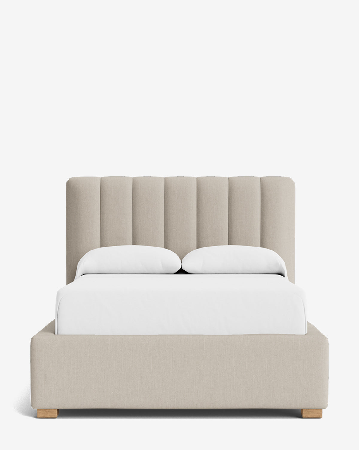 The Hoffman Bed Low Headboard showcases a customizable headboard with tall vertical panels, beige upholstery, white bedding, two pillows, and wooden legs, displayed against a plain white background by McGee & Co.