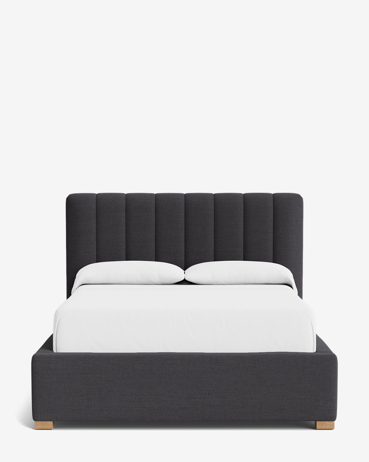 The Hoffman Bed Low Headboard features a dark gray upholstered frame and low headboard. Styled with white bedding and pillows, this modern bed is displayed against a plain white background for a clean, contemporary look by Vendixs