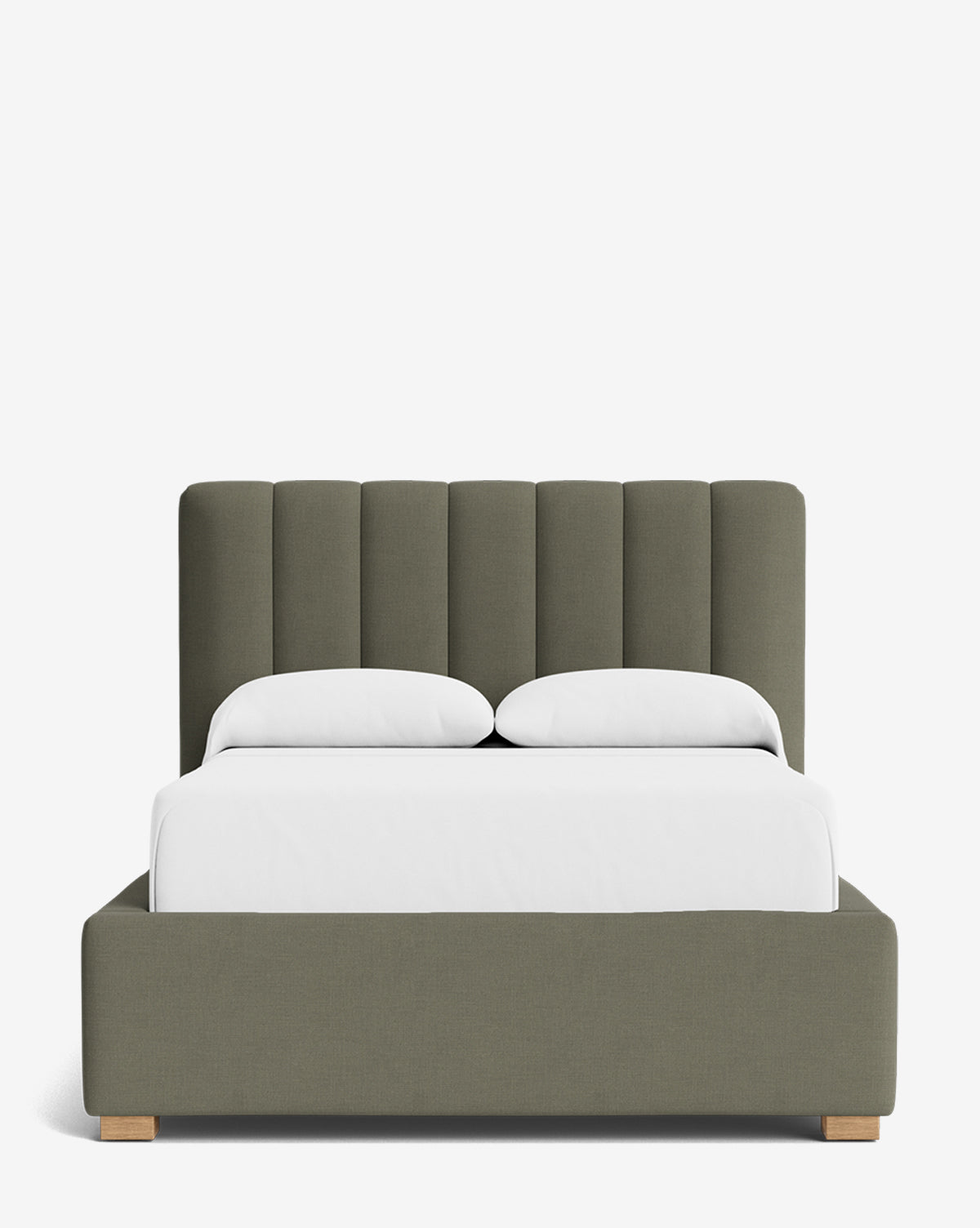 The Hoffman Bed Low Headboard features an olive green upholstered frame and crisp white bedding with two pillows, set against a plain white background. The headboard is customizable for a personalized touch, by McGee & Co.