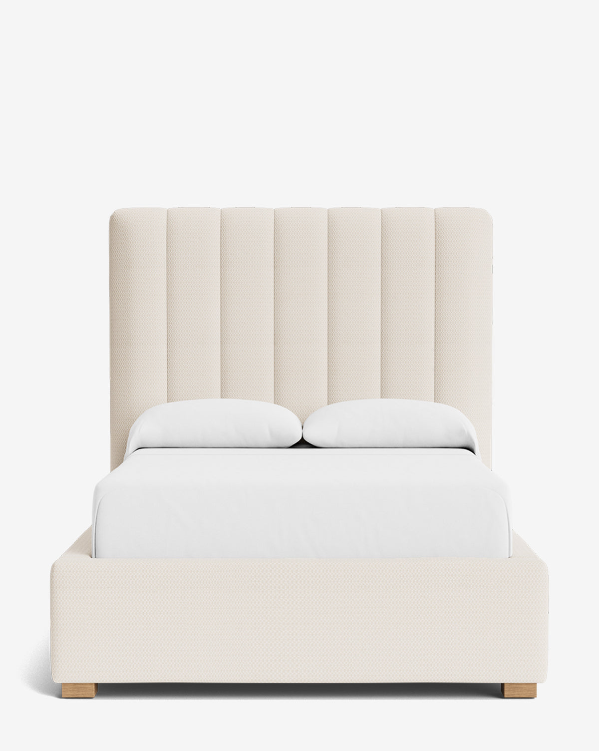 The Hoffman Bed Tall Headboard showcases vertical channels, customizable fabrics, white bedding, and light wood legs—all presented against a plain white background, by McGee & Co.