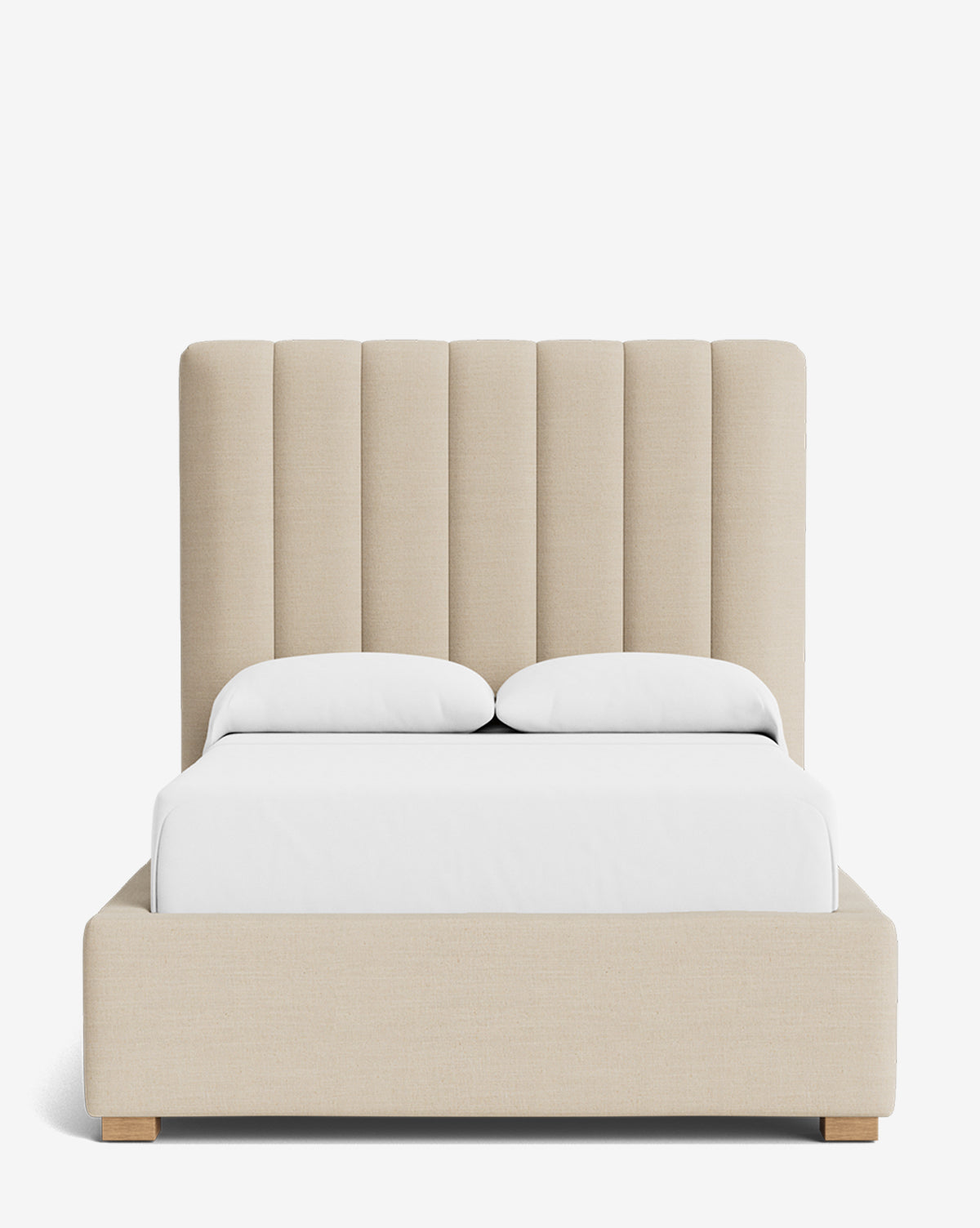 The Hoffman Bed Tall Headboard features a tall, vertically channeled headboard, wooden legs, and customizable upholstery. Shown with white bedding and two pillows against a plain white background by McGee & Co.