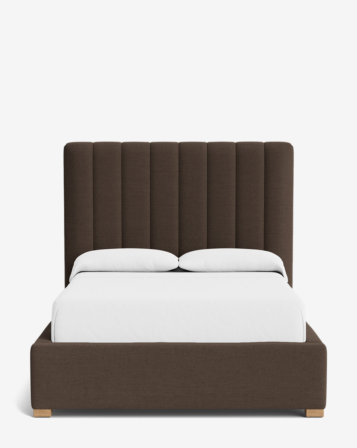 The Hoffman Bed Tall Headboard features a tall, vertically paneled dark brown upholstered headboard and matching frame with customizable fabrics, white pillows, and bedding, displayed against a plain white background by McGee & Co.