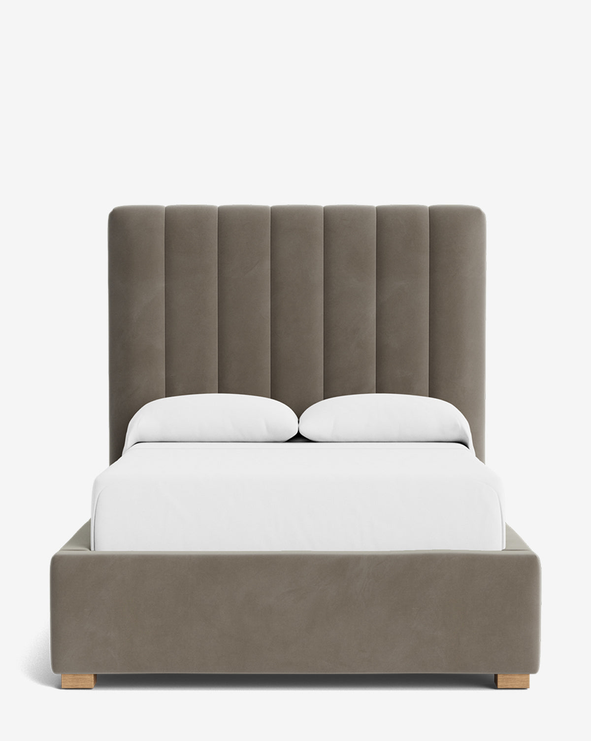 Front view of the Hoffman Bed Tall Headboard with a tall, vertically paneled gray upholstered headboard, white bedding, two pillows, and short wooden legs. Shown on a plain white background; available in customizable fabrics by Vendixs