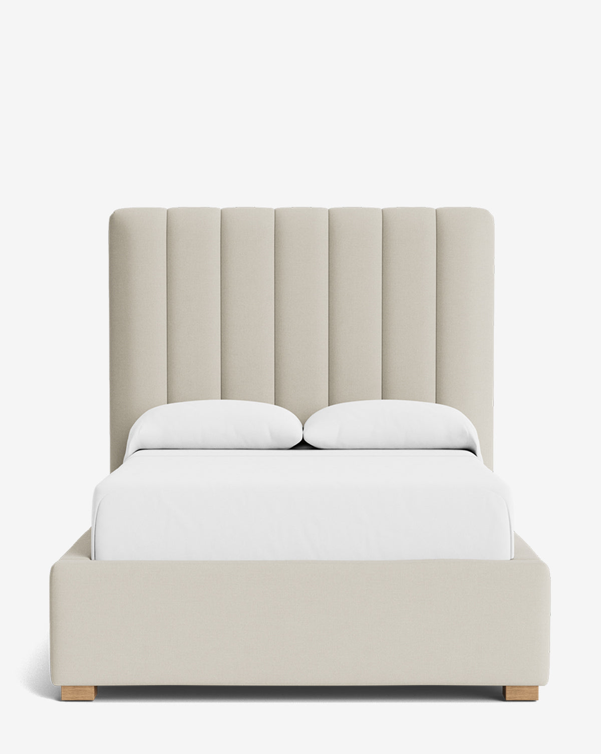 The Hoffman Bed Tall Headboard showcases vertical channel tufting, white bedding, low wooden legs, and customizable fabrics, all displayed on a plain white background, by Vendixs