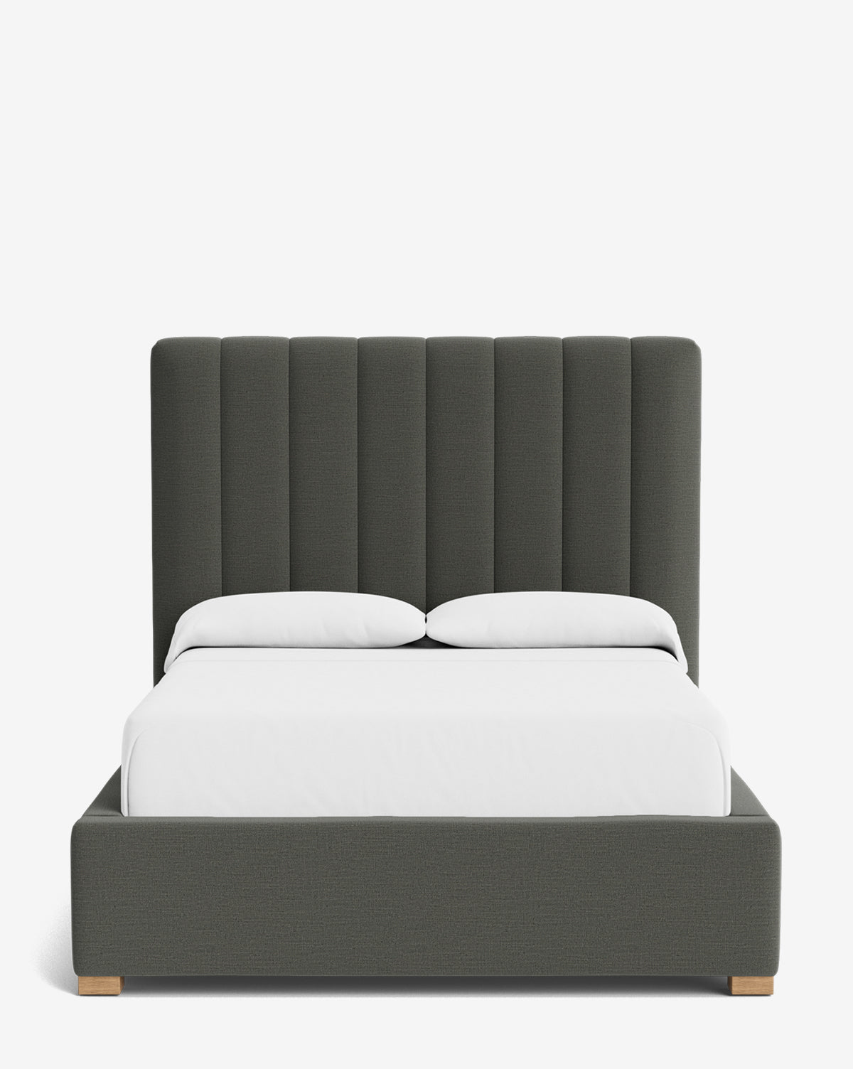 The Hoffman Bed Tall Headboard features a modern dark gray upholstered frame with a tall, vertically channeled headboard and low-profile design. It comes dressed with a plain white fitted sheet and pillows, and offers customizable fabric options by Vendixs