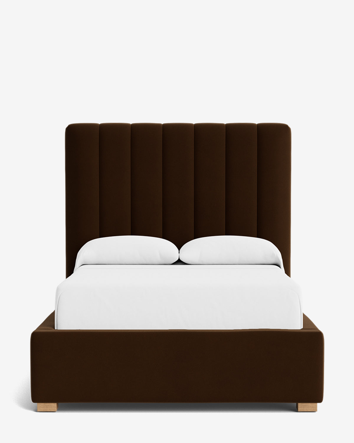 The Hoffman Bed Tall Headboard features a modern design with vertical channeled dark brown upholstery, customizable fabrics, white bedding, and two pillows, all displayed against a crisp white background by McGee & Co.