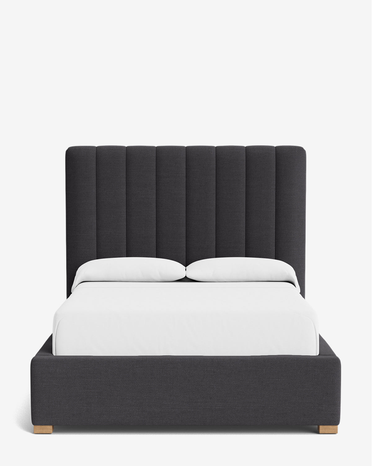 The Hoffman Bed Tall Headboard showcases a modern silhouette with a vertically paneled, dark gray upholstered headboard. It comes with a matching frame, white bedding, and two pillows—all in customizable fabrics to suit your style, by Vendixs